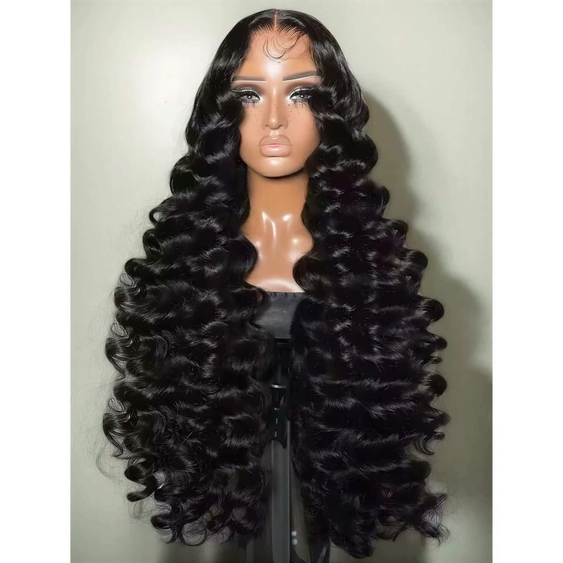 300 density loose wave HD lace wig with long, voluminous black curls displayed on a mannequin bust.